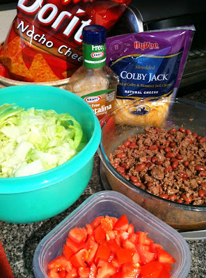 Taco Salad, with Doritos! -- BEST salad ever. Great for potlucks and picnics.