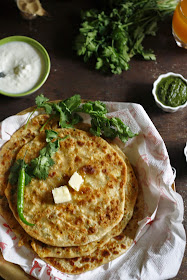 Spicy tangy potato filling inside this delicious paratha ..the perfect breakfast.
