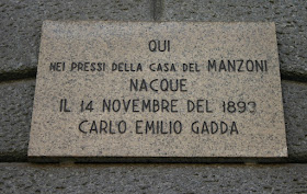 Gadda's birthplace in Milan is marked with a plaque