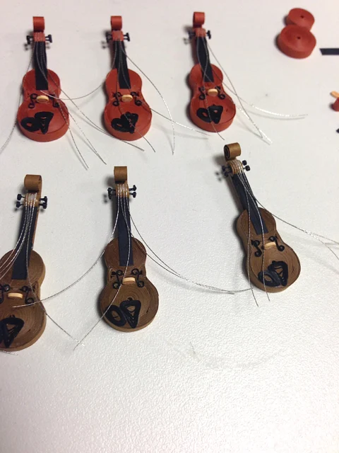 strings placed on quilled violins