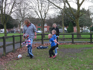 impromptu football game against a fence