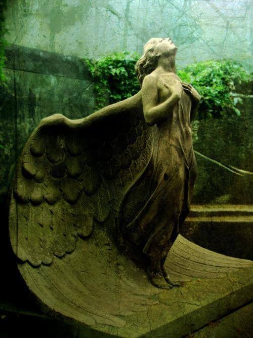 30 Of The World's Most Incredible Sculptures That Took Our Breath Away - Statue of an angel at the Powazki Cemetery, Poland