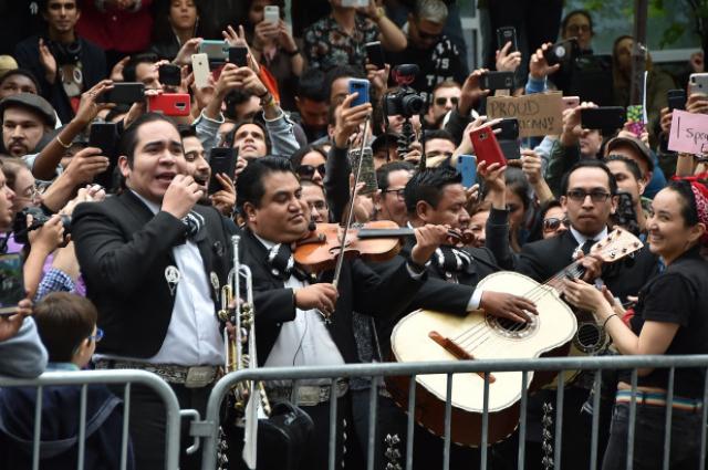 Go Fund Me block party with a Mariachi band and free tacos in front of racist Aaron Schlossberg's building.