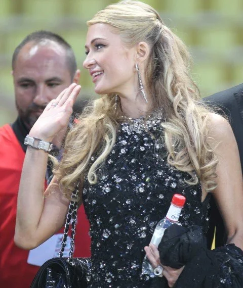 Prince Albert II of Monaco chats to Paris Hilton during the 22nd World Stars football match at the Stade Louis II in Monaco