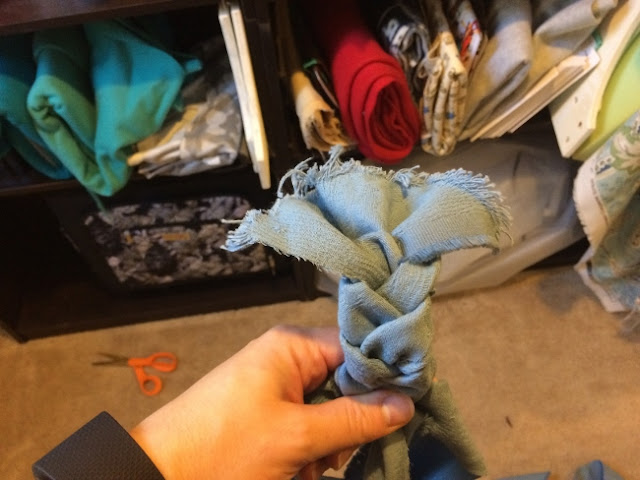 Braiding the fabric to create a fabric storage bin. Braiding the fabric to create a fabric storage bin.