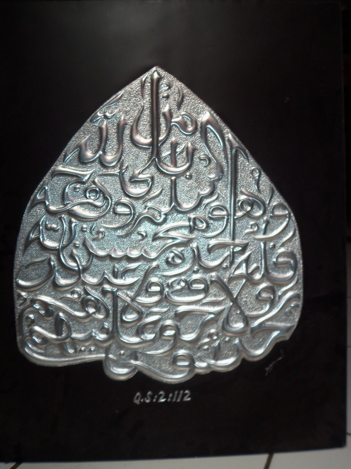 embos painting atau lukisan embos kalighraphy