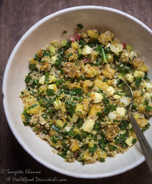 Indian style quinoa salad with potatoes and spring onion