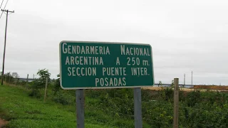 Street sign for the border crossing between Paraguay and Argentina