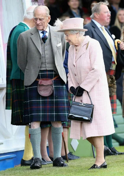 Queen Elizabeth ,Prince Philip and Prince Charles attend the annual Braemer Highland Games