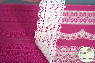 Removing edible lace from the mat