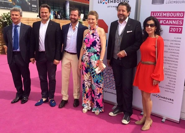 Hereditary Grand Duke Guillaume and Hereditary Grand Duchess Stéphanie at the Cannes Film Festival 2017. Stephanie wore colourful havana palm jumpsuit