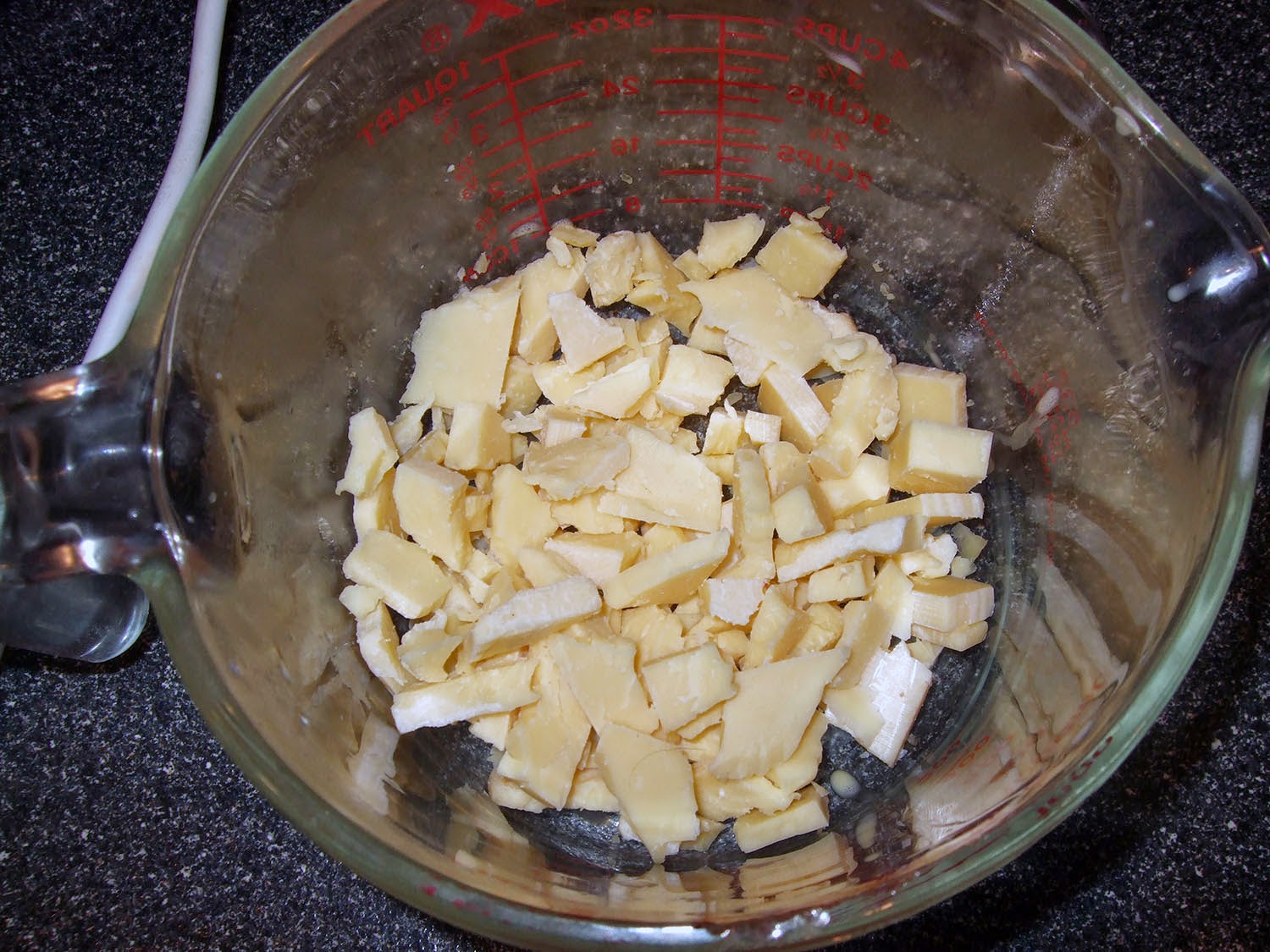 Crumbled cheddar cheese.