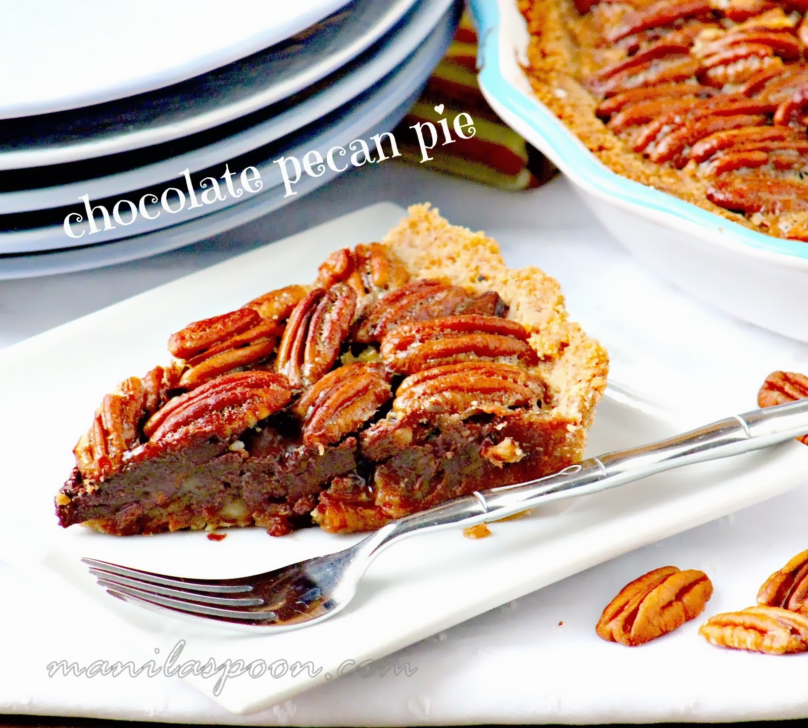 The ultimate dessert for Thanksgiving and Christmas - CHOCOLATE PECAN PIE! This is superbly yummy and looks so pretty, too! | manilaspoon.com
