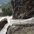 The Most Horrifying Road On Earth Has Two Waterfalls To Drive Through