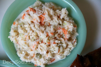 A basic cabbage coleslaw with a creamy vinegar and mayonnaise base.
