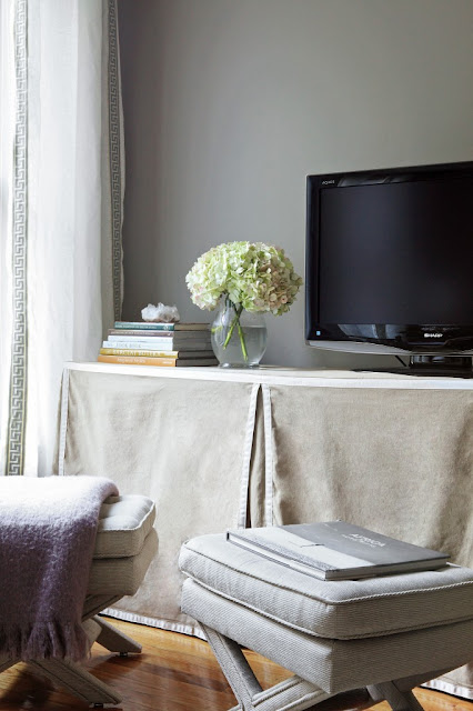 Ikea hack for Kallax shelving with slipcover as media console - found on Hello Lovely Studio