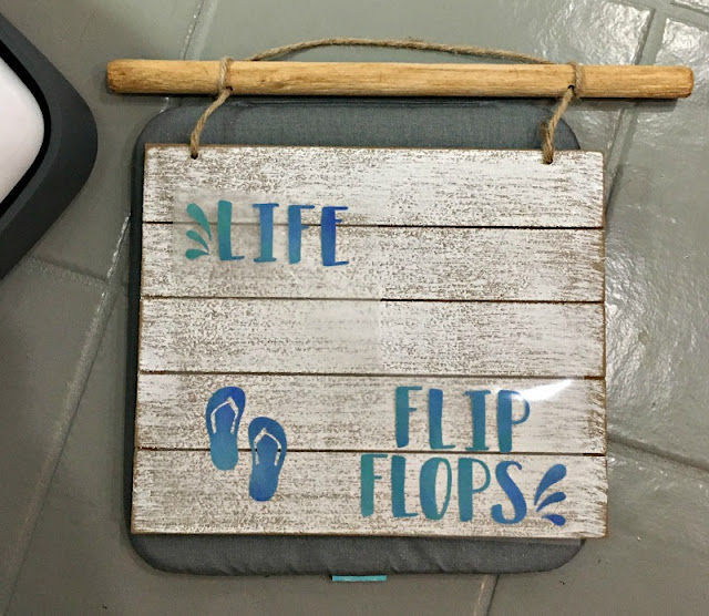 Did you know you could use Iron On vinyl on wood? See how I used it along with my Cricut to make this wooden summer sign!