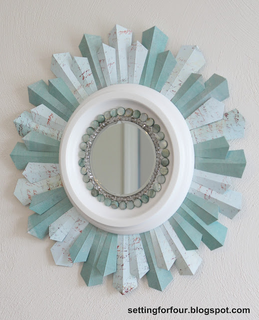 Beautiful Home Decor Idea! Learn how to make this gorgeous DIY Sunburst Mirror using a ceiling medallion and beads! Includes a step by step fun tutorial with full instructions and supply list. Perk up a wall in any room with this bead and paper craft idea. Customize it with other colors too!