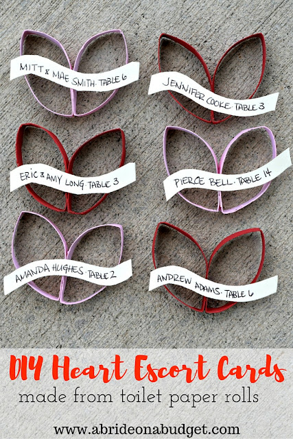 Who loves upcycling?  Check out these cute DIY heart escort cards made from toilet paper rolls by www.abrideonabudget.com.