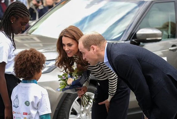 Kate Middleton's trousers are the L.K. Bennett Parker style. L.K. Bennett sweater. Rupert Sanderson Malory suede pumps