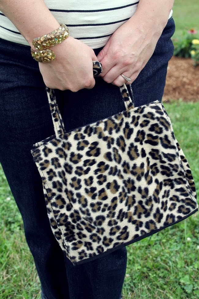 leopard print handbag and lucite clamper bracelet