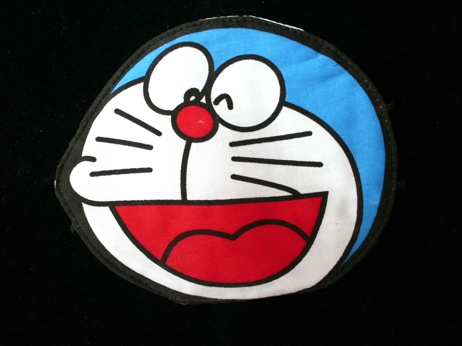 makacio com Masker Kepala Doraemon Rp 10 000 