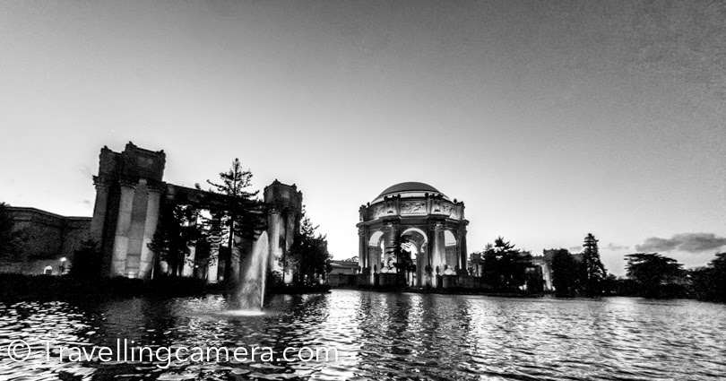 During my recent visit to San Francisco, I managed to take a quick tour of Palace of Fine Arts. It was late evening when I reached and before getting dark, I shot few shots of this beautiful building. This photo journey shares some information about the place and few shots. The Palace of Fine Arts is one of the most beautiful architectures in San Francisco and located quite close to Golden Gate Bridge. Last time when I visited San Francisco, we crossed through this building during the Photo Walk, but couldn't stop due to lack of time. This is located around a very nice neighborhood and there are some interesting walks. We walked around the streets for some time and then headed back to Union Square by taking bus. Bus is easily available for this place and the one which connects Union Square area, drops you at mission street.There is this beautiful water body in front of this marvelous building and few green parks around it. All these things make this place stunning. I don't really know what else can be done here during the day, but I would want to visit this place again during day and explore more.