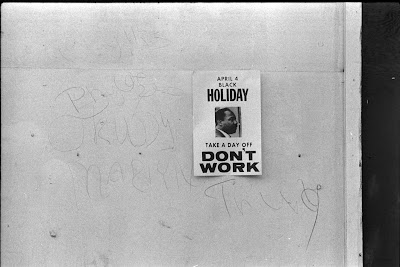 sign promoting a holiday to honor the anniversary of the assassination of Martin Luther King, Jr.