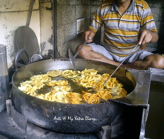 Hot piping Jalebis being fried at Old famous Jalebiwala - Chandni Chawk street food, Delhi