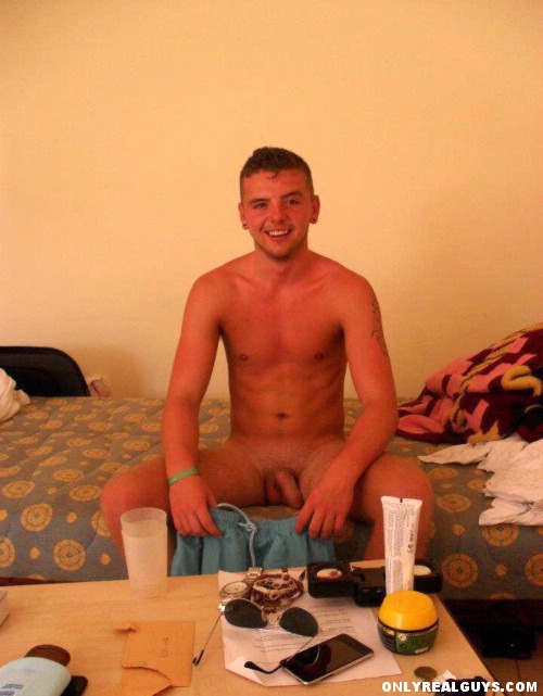 Hot Aussie boy caught sitting naked on the edge of the bed.