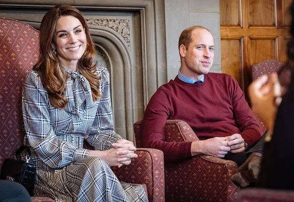 Kate Middleton wore a green Alexander McQueen coat, a print dress by Zara, Zeen ceramic earrings and Aspinal of London Mayfair bag