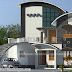 2027 sq-ft curved roof mix modern home
