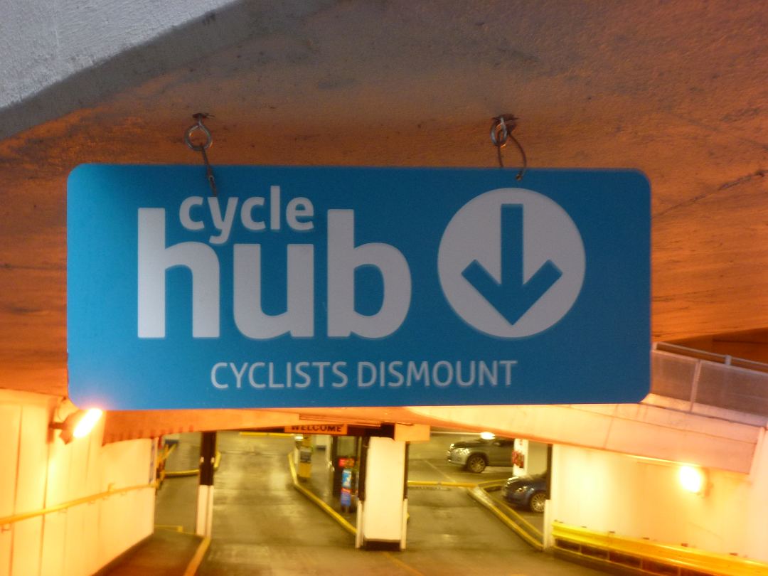 Mad Cycle Lanes of Manchester cycle hub CYCLISTS DISMOUNT