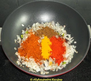 add spice powder to make mango rice