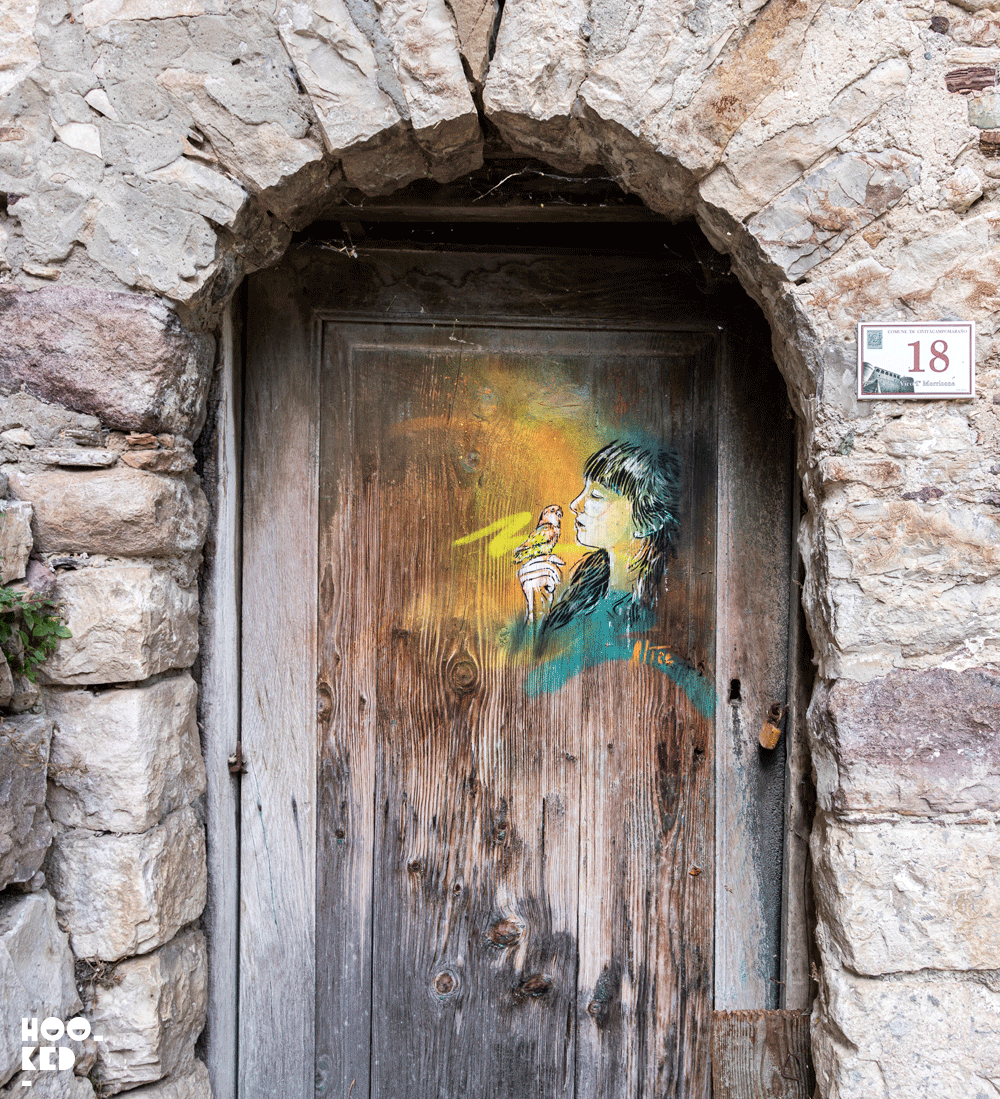 Stencil Street art in Civita campomarano, Italy by street artist Alice Pasquini