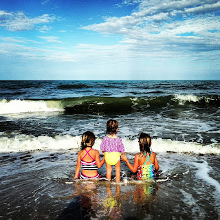 My family playing in the waves in Florida
