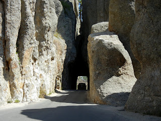 Narrow tunnels while driving on the Needles Highway in Custer State Park in South Dakota