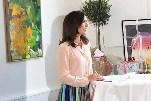 Crown Princess Mary wore Diane Von Furstenberg Tailored Asymmetric Overlay Skirt. The Danish Women's Society and The Mary Foundation.