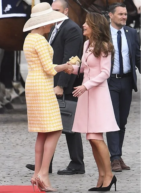 King Philippe and Queen Mathilde of Belgium welcome King Abdullah and Queen Rania of Jordan during an official welcome ceremony at the Royal Palace in Brussels