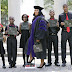 Single mother of 5 proudly poses with children in law school graduation photos: 'We did it'