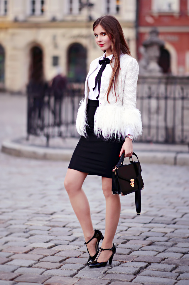 Black crossbody bag with feathers