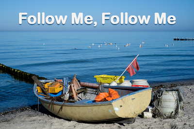 boat on the seashore - follow me