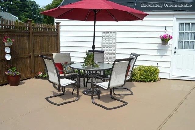 Painted Outdoor backyard Patio with chairs and table