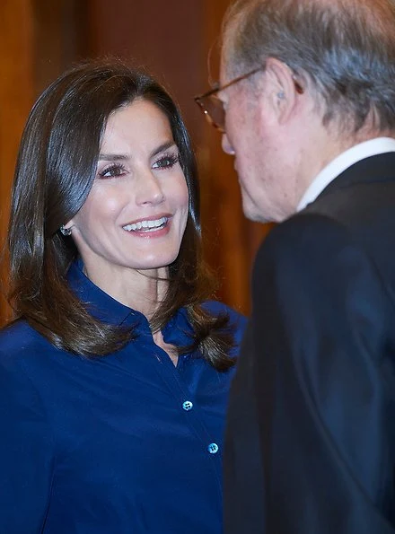 Queen Letizia wore Hugo Boss high waisted pencil skirt same worn Crown Princess Mary,, and Carolina Herrera navy shirt, and Magrit pumps