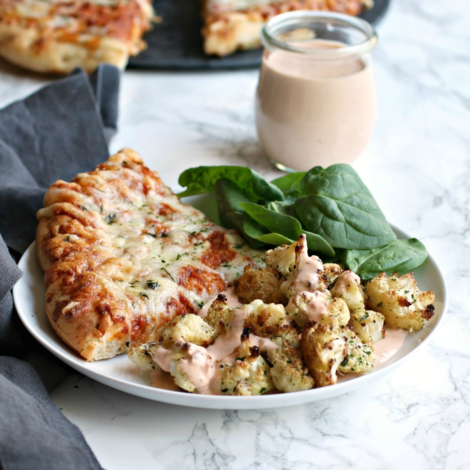 Hungry Couple Roasted Cauliflower with Tomato Greek Yogurt Tahini Sauce