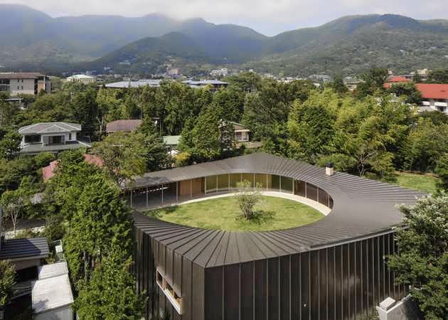 Kanagawa The large house Design Betrays Square Exterior with Teardrop Shaped