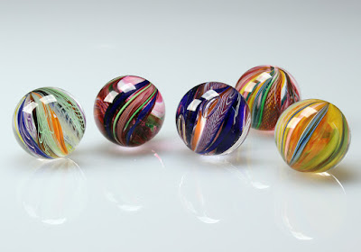 Holen or Jolens (marbles in English) Holen or Jolens (marbles in English)