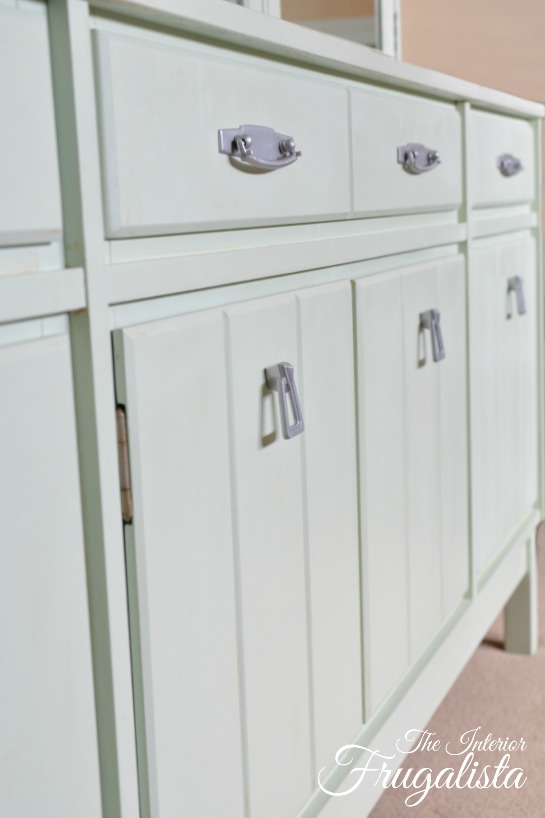 A vintage mid-century china cabinet makeover and how to give it a much lighter and brighter look with pretty Pistachio mint green chalk style paint.