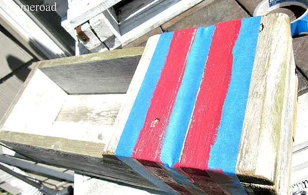 red stripes to create a buoy look on a DIY crate