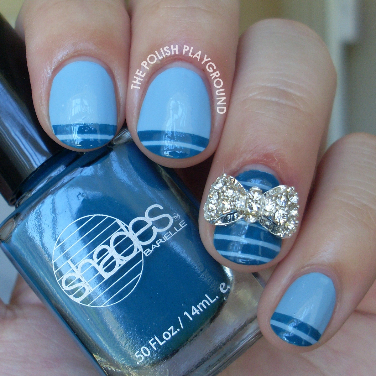 Blue Tip Stripes with Bow Stud Nail Art